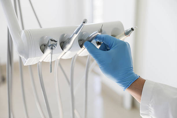 Professional Invisalign Clear Aligners technician working in Lake Grove, NY
